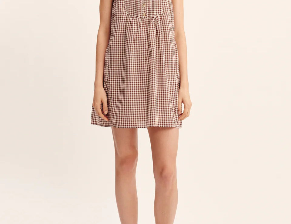 Women wearing Posse's Callie Shift Mini Dress in Mocha Gingham.