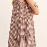 Women wearing Posse's Callie Shift Mini Dress in Mocha Gingham.